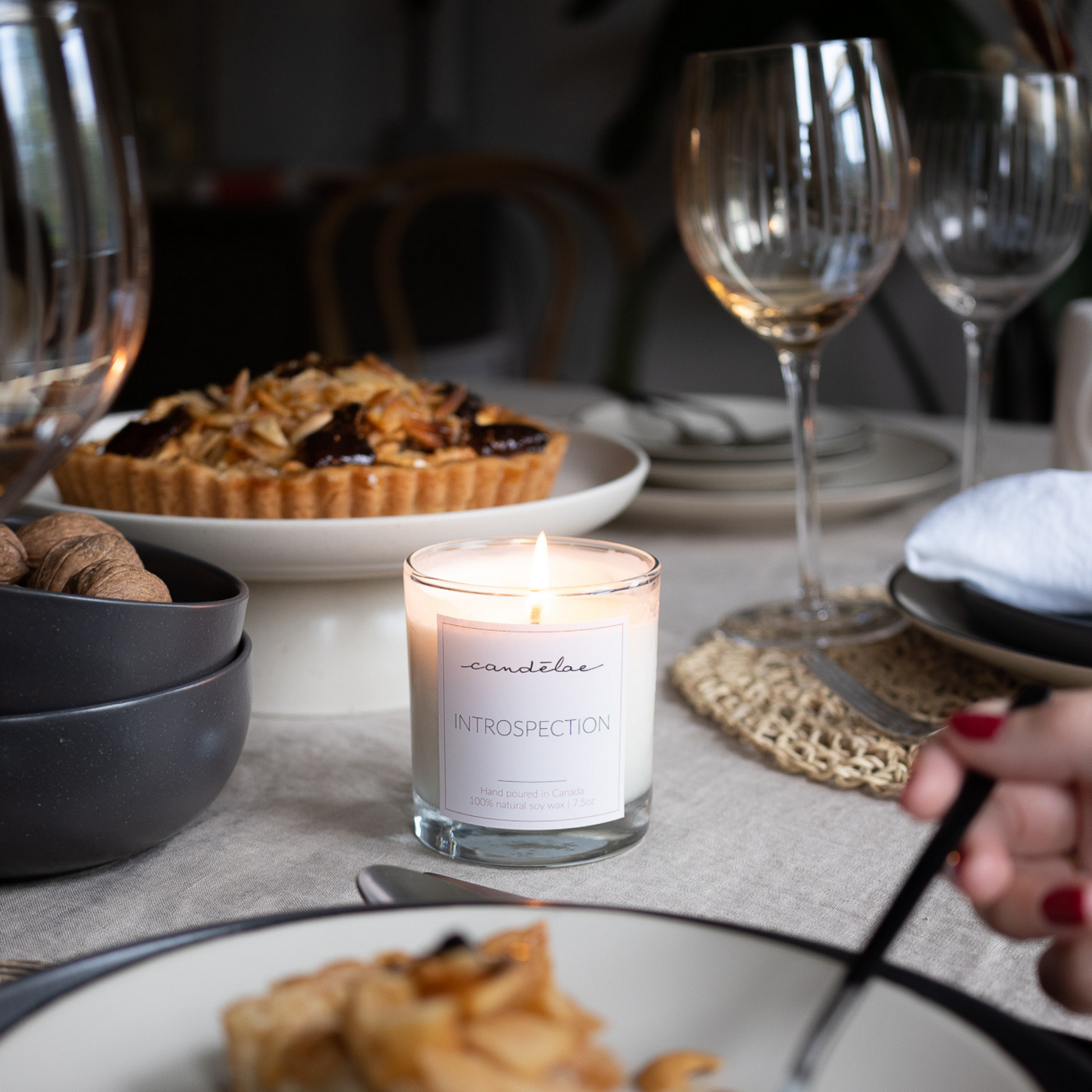 Introspection candle is set in the middle of the table for Thanksgiving