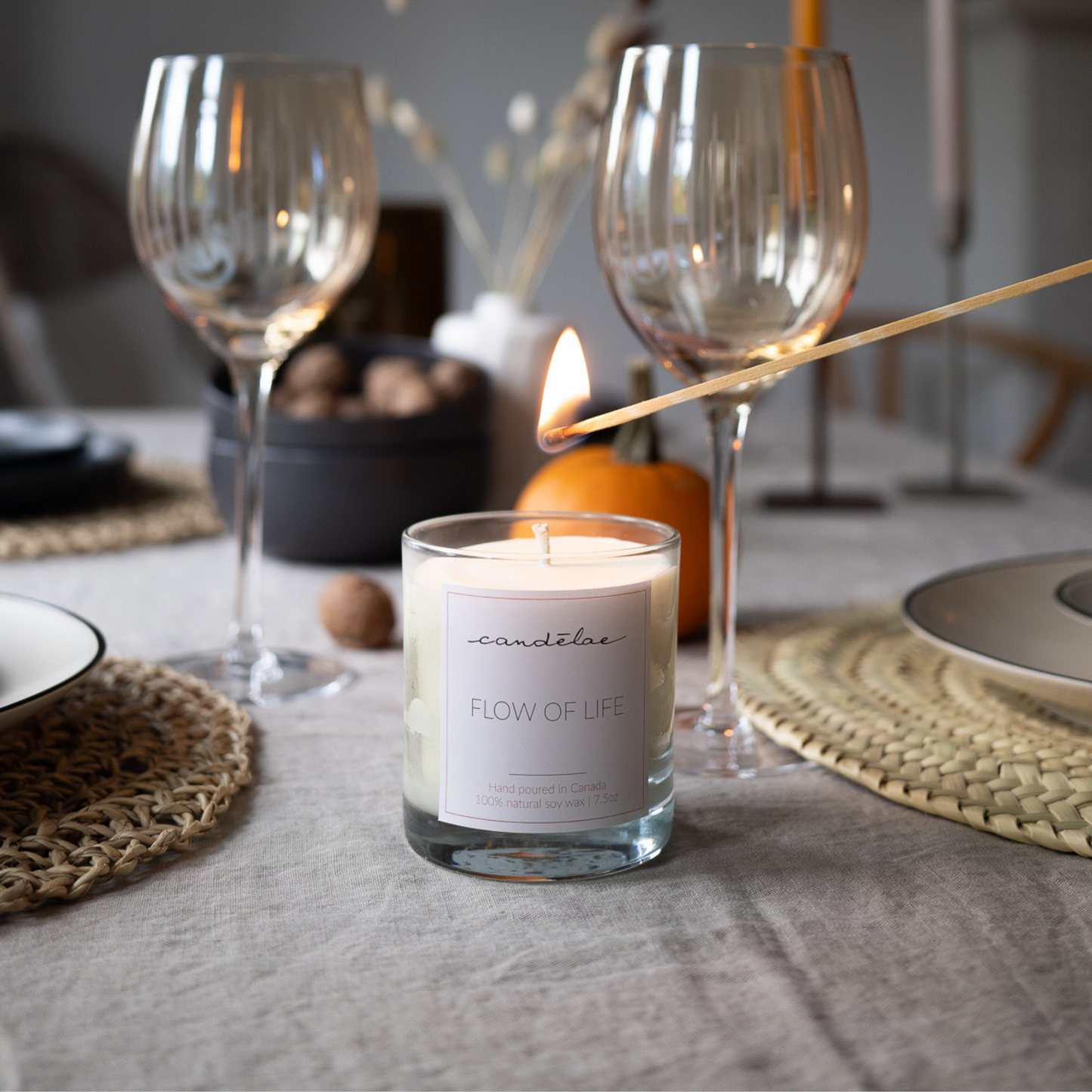 This scented soy wax candle from candēlae is at the center of the table for Christmas