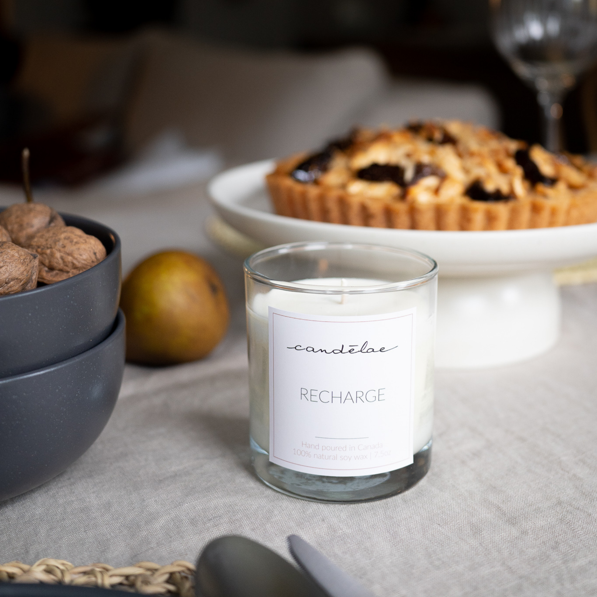Recharge soy wax candle by candēlae is displayed for a dinner in Toronto, Ontario, Canada