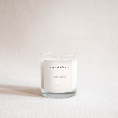 Emphasis scented candle from candēlae is placed on a white background for photoshoot