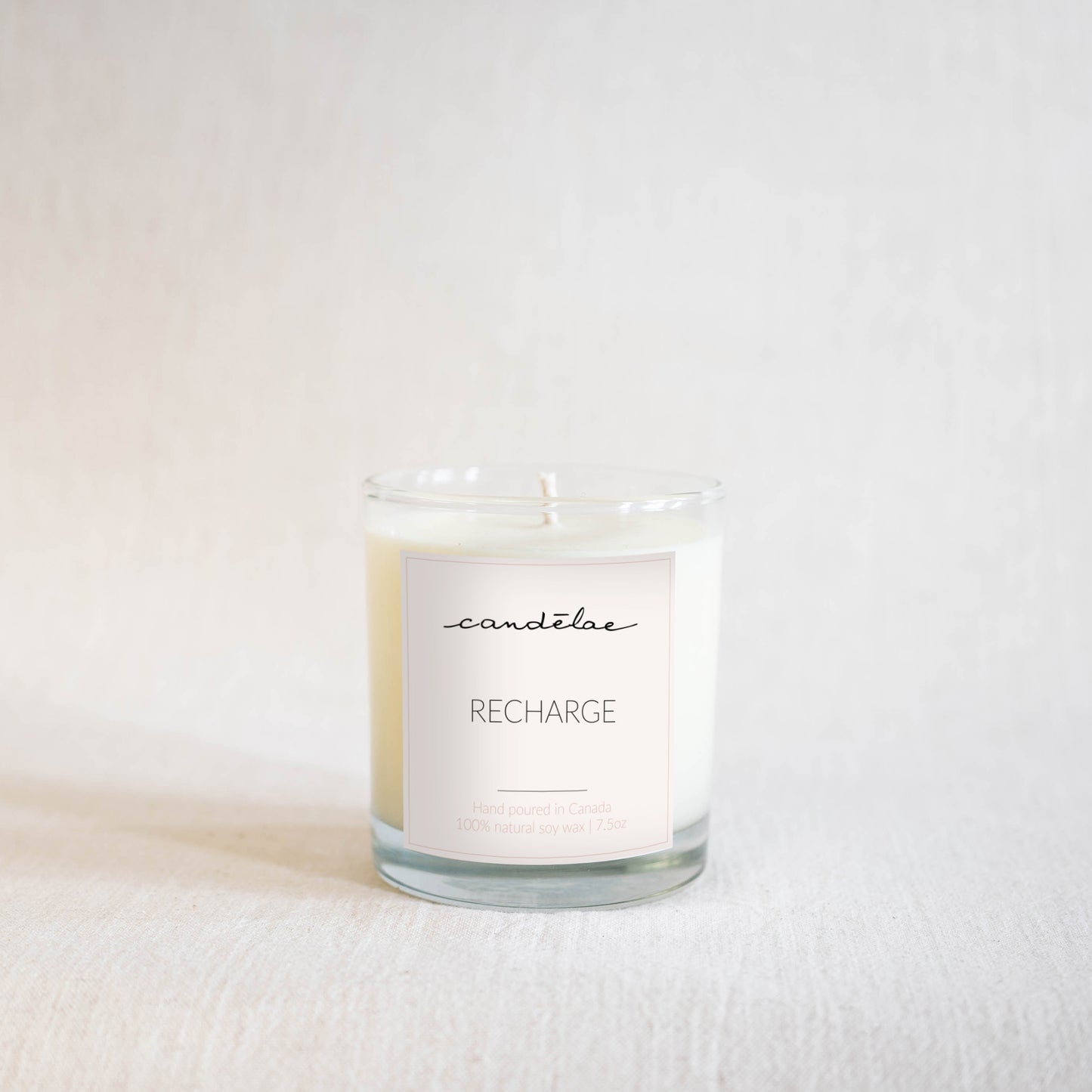 Recharge scented candle by candēlae is ready to be photographed in Toronto, Ontario